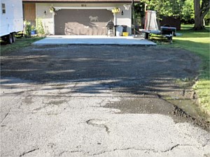 Dig out existing Blacktop driveway
