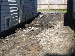 Dig out of old concrete driveway